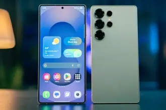 Two smartphones displayed side by side: the left shows a vibrant home screen, the right reveals a quad-camera module on the back, both on a reflective surface.